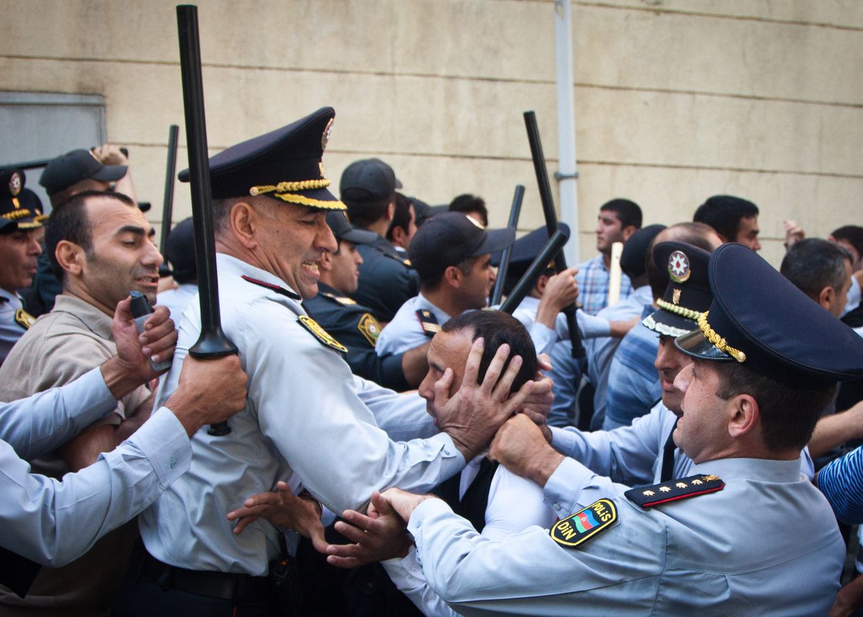 Azerbaijan School Hijab Ban Sparks Protests and Arrests as Enforcement Widens 5 Azerbaijani police detaining a protester during demonstrations