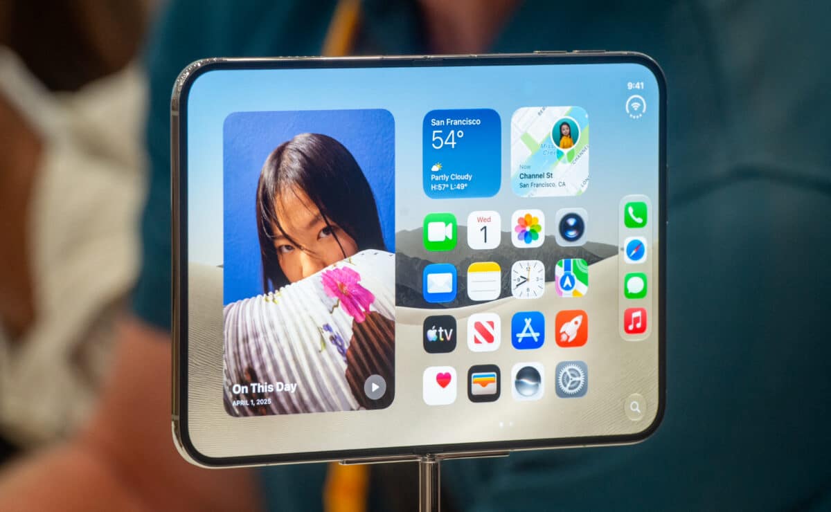 The iPhone Duo unfolded showing its large 7.6-inch inner display at Apple's launch event