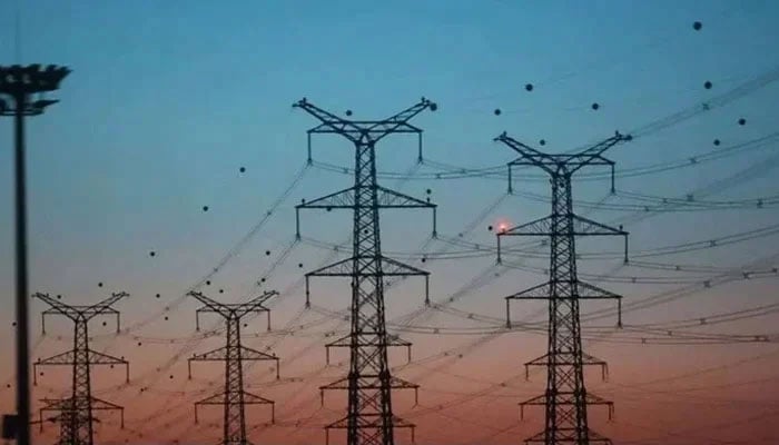 Power Division Averts Rs6 Per Unit Electricity Hike — September FPA Contained at Rs2.56 5 High-voltage electricity transmission pylons against the evening sky in Pakistan