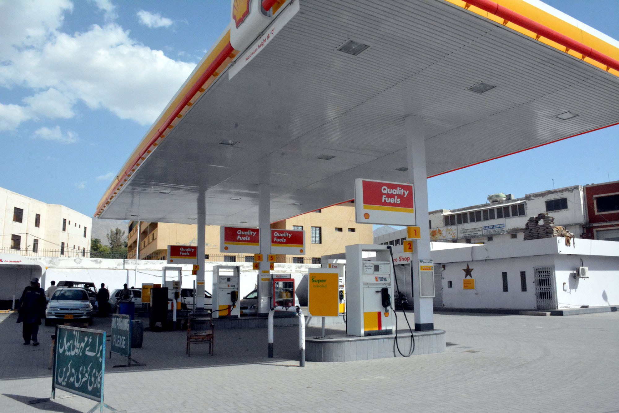 Petrol Cut by Rs3.63/L, Diesel Up Re0.31 for October 16 — New Rates 6 A Shell fuel station in Pakistan with dispensers and signage
