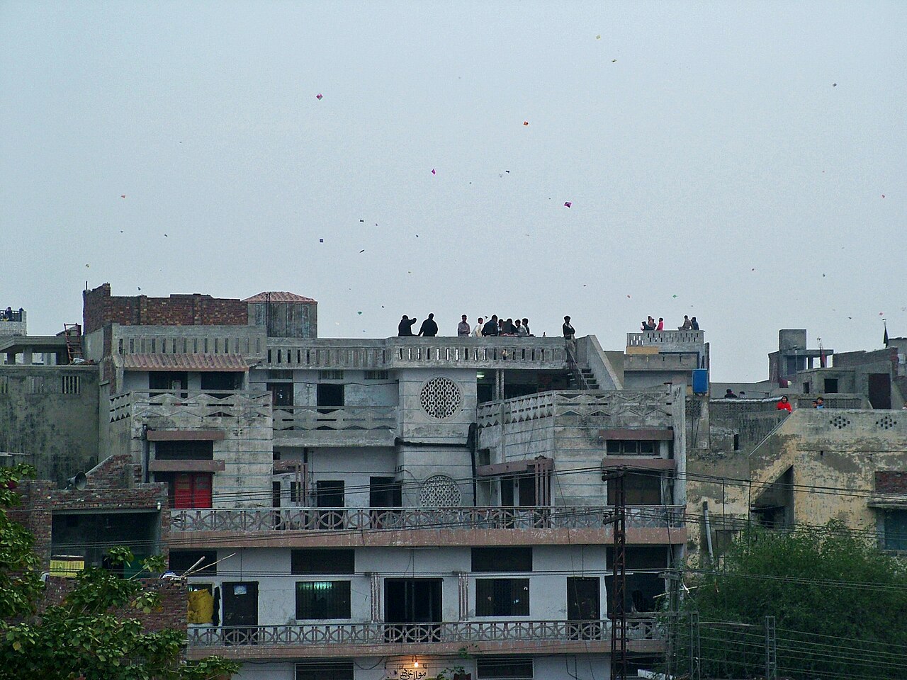 Kites filling the Lahore sky above rooftops during the Basant kite festival