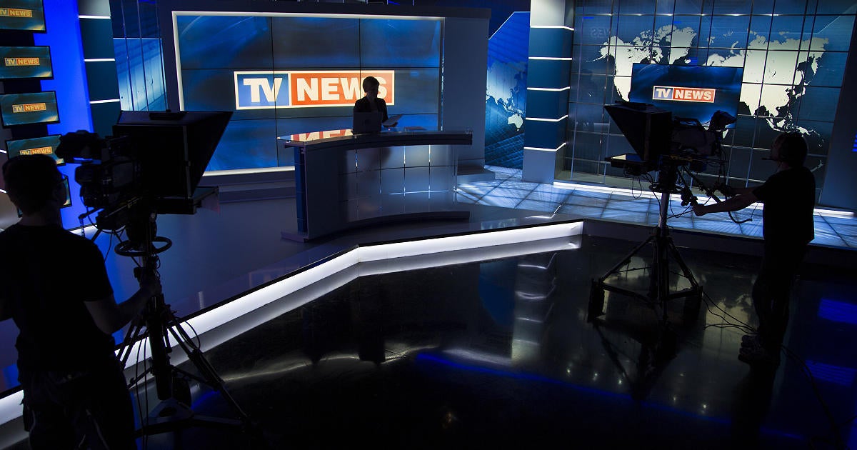 PEMRA Bars Live Coverage of Blasts, Firing and Terrorist Attacks — Verified Info and Time Delay Only 5 Television news studio with cameras and anchor desk