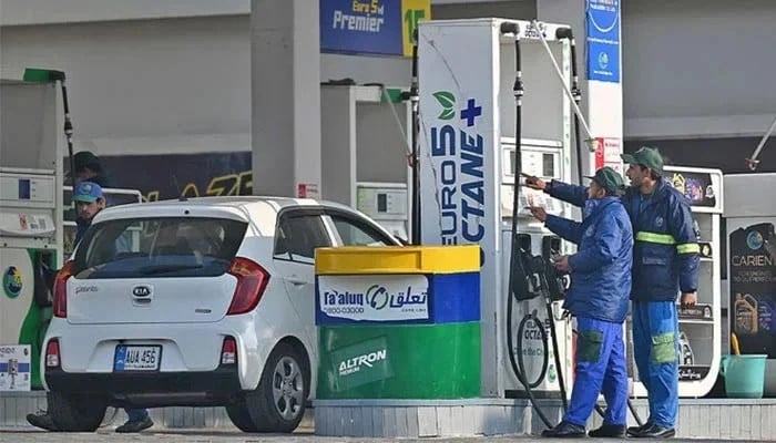 Petrol Cut by Rs3.93/L to Rs386.30, Diesel Unchanged — New Rates for Oct 17–19 7 A car refuelling at a petrol station in Pakistan